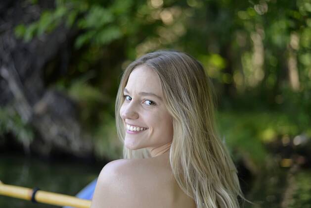 Portrait of smiling blond woman kayaking model released Symbolfoto  BFRF01895