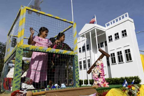 December 9, 2018 - Los Angeles, California, United States - A float containing children in a cage and a replica of the White House, in opposition to the Trump administration s detention of illegal immigrants, takes part in the procession honoring Our Lady of Guadalupe in Los Angeles, California on December 9, 2018. Los Angeles United States  - ZUMAn230 20181209_zaa_n230_553 Copyright: xRonenxTivonyx