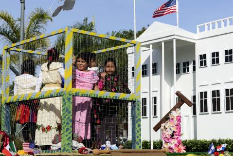 December 9, 2018 - Los Angeles, California, United States - A float with children in a cage and a replica of the White House, in opposition to the Trump administration s detention of illegal immigrants, takes part in the procession honoring Our Lady of Guadalupe in Los Angeles, California on December 9, 2018. Los Angeles United States  - ZUMAn230 20181209_zaa_n230_562 Copyright: xRonenxTivonyx