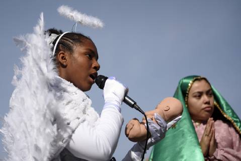 December 9, 2018 - Los Angeles, California, United States - People take part in the 87th Annual Procession and Mass in honor of Our Lady of Guadalupe in Los Angeles, California on December 9, 2018. The Catholic procession is the oldest religious procession in Los Angeles and celebrates the apparition of the Virgin Mary in Mexico in 1531. Los Angeles United States  - ZUMAn230 20181209_zaa_n230_563 Copyright: xRonenxTivonyx