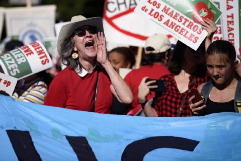 December 15, 2018 - Los Angeles, California, United States - Teachers and supporters of public education march against education funding cuts during the March for Public Education in Los Angeles, California on December 15, 2018. The rally, organized by United Teachers Los Angeles, drew thousands of educators who demanded wage increases and smaller class sizes. Los Angeles United States  - ZUMAn230 20181215_zaa_n230_898 Copyright: xRonenxTivonyx