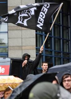 Protesters protest against the march of right-wing extremists in Leipzig on 3 Oct 2006 Eckehard Schulz Left wing demonstrators protest against a rally of far right wing supporters in Leipzig eastern Germany Oct 3 2006 Eckehard Schulz LEIPZIG DEU