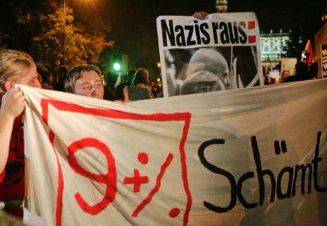 Demonstrators protest against the NPDs entry into the Saxon state parliament on Sunday 19 Sept 2004 The right-wing extremist party received more than 9 percent of votes Eckehard Schulz Demonstrators protest against the election result of the German right wing party NPD in front of the parliament in
