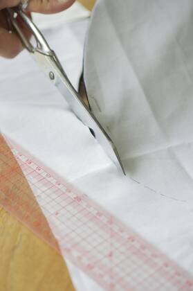 Cutting fabric, cropped  Copyright: FrédéricxCirou B24512630