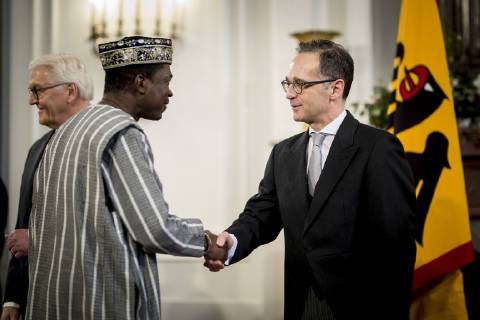 Heiko Maas R Federal Foreign Minister welcomes Simplice Honore Guibila Burkina Faso ambassador to Germany at the Presidents New Years reception for the Diplomatic Corps in Berlin 14 01 2019 Berlin Germany Copyright: xFlorianxGaertnerx