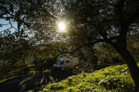 A WOhnmobil stands on the street near Arbus Sardinia Italy A camper parks on a street