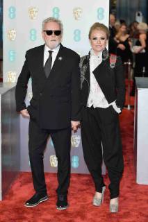 LONDON, UK - FEBRUARY 10: Roger Taylor and Sarina Potgieter at the 72nd British Academy Film Awards held at Albert Hall on February 10, 2019 in London, United Kingdom. Photo: imageSPACE MediaPunch Copyright: xCopyrightedx