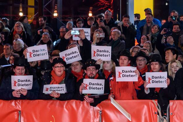 Film fans disguised as Dieter Kosslick thank the outgoing festival director during the award ceremony for the 69th Berlin International Film Festival snapshot photography F Boillot