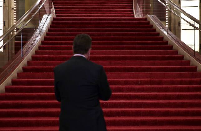 A security guard watches the Grand Staircase at the Dolby Theater as preparations continue for the 91st Academy Awards in the Hollywood section of Los Angeles on February 23, 2019. Oscar winners will be announced during an ABC live telecast on February 24th.  LAP201902239009 JOHNxANGELILLO
