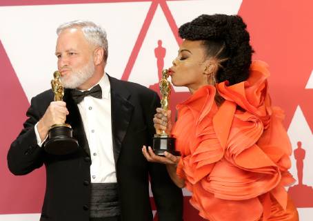 (L-R) Jay Hart and Hannah Beachler, winners of the award for Best Production Design for Black Panther, appear backstage with their Oscar during the 91st annual Academy Awards at Loews Hollywood Hotel in the Hollywood section of Los Angeles on February 24, 2019.  LAP20190224701 JOHNxANGELILLO