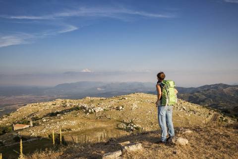 Greece, Peloponnese, Arcadia, Lykaion, woman enjoying the view from mountain Profitis Ilias model released Symbolfoto  MAMF00327
