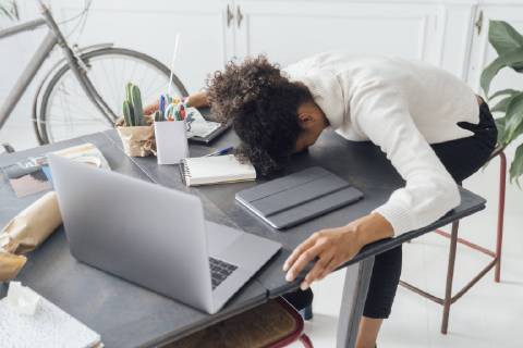 Tired freelancer sleeping on her deak model released Symbolfoto property released  BOYF00941
