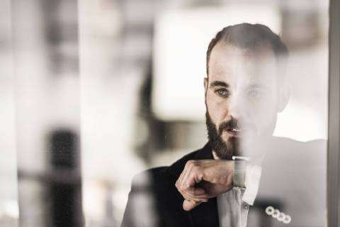 Businessman using smartwatch, portrait model released Symbolfoto property released  MJRF00129