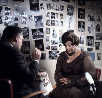 The American jazz singer ELLA FITZGERALD here during an interview in the wardrobe gives a concert in the Deutschlandhalle in Berlin 11 February 1968 Interview with American Jazz singer the Great Ella Fitzgerald before the Concert at the Deutschlandhalle in Berlin 11 February 1968 Berlin F USA 1999 Copyright: ArthurxGrimm UnitedArchives00641755