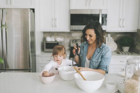 Mother and daughter making a cake together model released Symbolfoto property released CMSF00032
