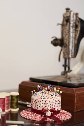 Old vintage sewing machine with pin chusion in shape of a hat property released  IGGF01027