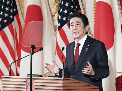 Trump in Japan Japanese Prime Minister Shinzo Abe speaks during a joint press conference with U.S. President Donald Trump at the State Guest House in Tokyo on May 27, 2019. (Pool photo)