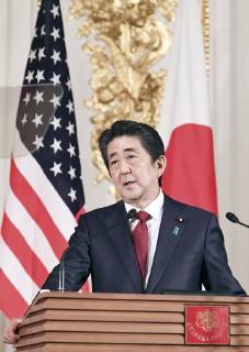 Trump in Japan Japanese Prime Minister Shinzo Abe speaks during a joint press conference with U.S. President Donald Trump at the State Guest House in Tokyo on May 27, 2019. (Pool photo)