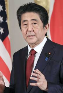 Trump in Japan Japanese Prime Minister Shinzo Abe attends a joint press conference with U.S. President Donald Trump at the State Guest House in Tokyo on May 27, 2019. (Pool photo)