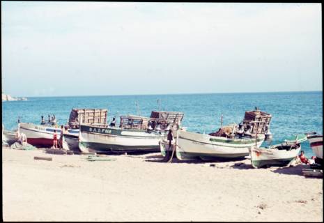 Spain Spain, ca 1956, holidays at the beach, holidays in Spain, bathing between fishing boats