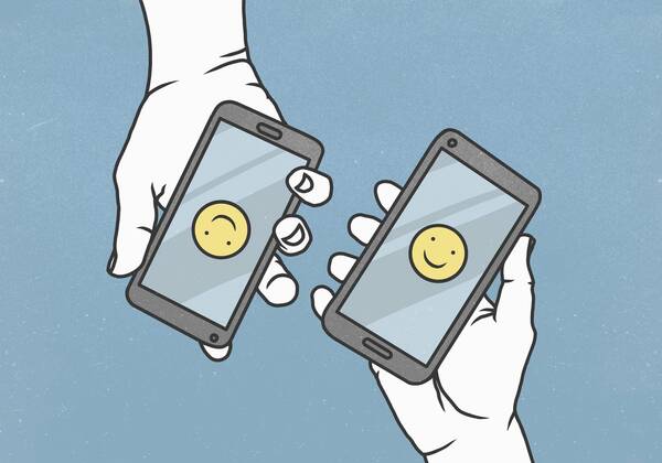 View from above smiley faces on smart phones  Copyright: MaltexMueller fStopImages1827021