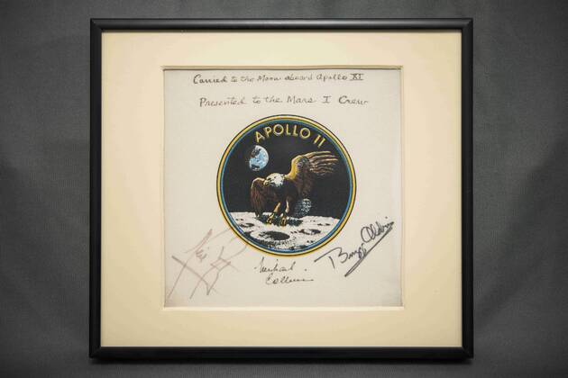 July 11, 2014 - Washington, District of Columbia, U.S. - This framed Apollo 11 mission patch was presented to NASA s Kennedy Space Center during the July 21, 2014, when the center s Operations and Checkout Building was renamed the Neil Armstrong Operations and Checkout Building. The patch was flown aboard Apollo 11 in 1969. In 1987, all three crewmembers Neil Armstrong, Buzz Aldrin and Michael Collins signed the patch and presented it to former NASA Administrator James C. Fletcher for safekeeping until it could be presented to the first crew to land on Mars Washington U.S. - ZUMAz03_ 20140711_sha_z03_366 Copyright: xJoelxKowskyx