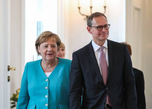 (190717) -- BERLIIN, July 17, 2019 -- German Chancellor Angela Merkel (L) and Michael Mueller, deputy president of the Bundesrat and Berlin s head of government, arrive for a ceremony for the appointment of German Defense Minister at the Bellevue Palace in Berlin, capital of Germany, July 17, 2019. The leader of the German ruling party Christian Democratic Union (CDU) , Annegret Kramp-Karrenbauer, was appointed new German Minister for Defense on Wednesday. ) GERMANY-BERLIIN-KRAMP-KARRENBAUER-DEFENSE MINISTER-INAUGURATION ShanxYuqi 