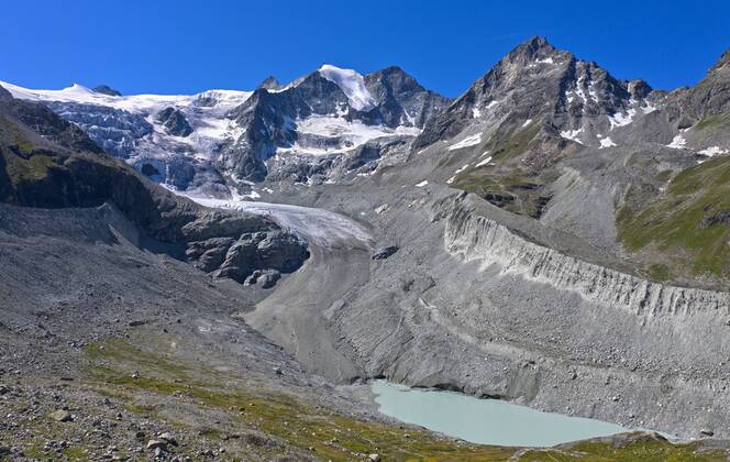 Moiry Glacier, Glacier de Moiry, flowing down the Pointe de Mourti, ending in a glacier tongue, moraine and the glacial lake, Val d Anniviers, Valais, Switzerland