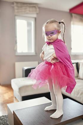 Girl wearing costume of a superwoman model released Symbolfoto property released  ZEDF02482