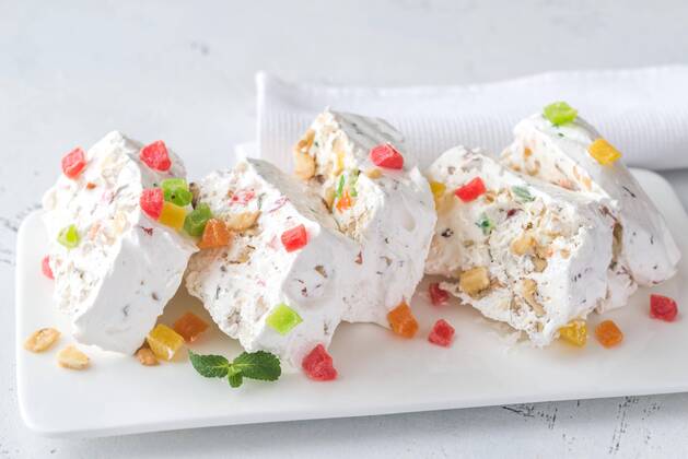  White nougat with fresh mint leaves  Copyright: xAlex9500x Panthermedia26639188