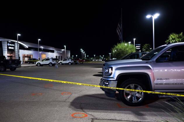 August 31, 2019, Odessa, Texas, USA: Crime tape blocks off an area at a dealership where a gunman opened fire in Odessa, Texas. The gunman, who hijacked a U.S. Postal Service van, drove through the towns of Midland and Odessa fatally shooting five people and wounding 21 others earlier in the day. Odessa USA - ZUMAj106 20190831_zap_j106_004 Copyright: xJoelxAngelxJuarezx