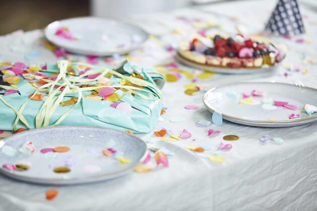 Present on table, decorated with confetti property released  MCF00217