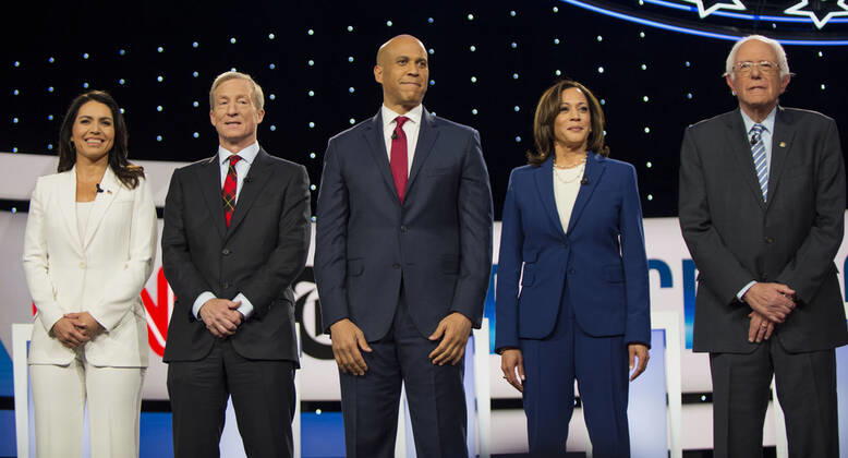 Sept.15, 2019 - Westerville, Ohio, U.S. - From left, TULSI GABBARD, TOM STEYER, CORY BOOKER, KAMALA HARRIS, BERNIE SANDERS pose for photographers prior to the Democratic Presidential Debate held at Otterbein University. Westerville U.S. - ZUMAce6_ 20191015_zaf_ce6_021 Copyright: xBrianxCahnx