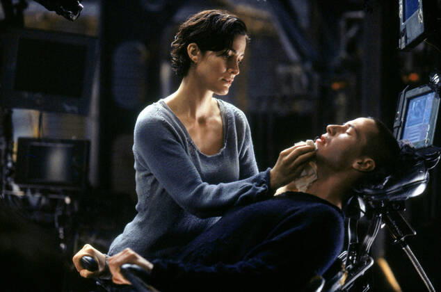 Carrie-Anne Moss & Keanu Reeves Characters: Trinity, Neo Film: The Matrix (USA AUS 1999) Director: The Wachowski Brothers 31 March 1999 Copyright: MaryxEvansxAFxArchivexWarnerxBros. 12574466 editorial use only
