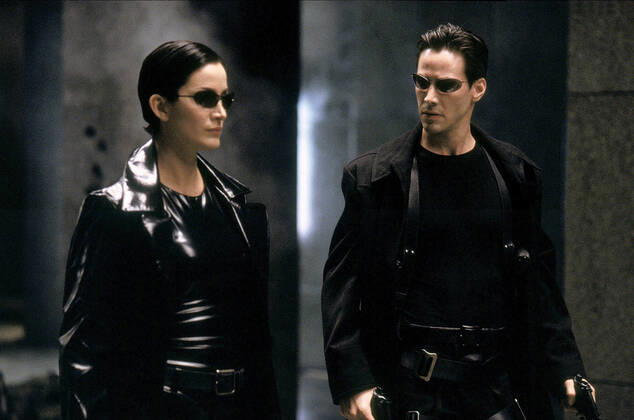 Carrie-Anne Moss & Keanu Reeves Characters: Trinity, Neo Film: The Matrix (USA AUS 1999) Director: The Wachowski Brothers 31 March 1999 Copyright: MaryxEvansxAFxArchivexWarnerxBros. 12574468 editorial use only