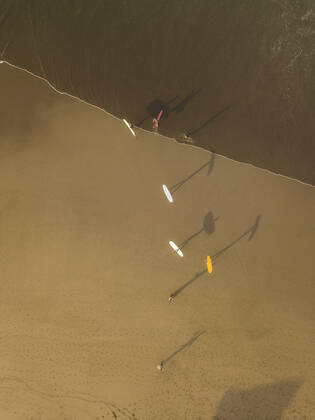 Aerial view of surfers at the beach Indonesia, Bali CR_KOTRIN191014C-220157-01