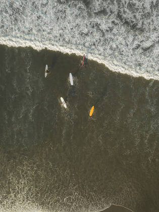 Aerial view of surfers at the beach Indonesia, Bali CR_KOTRIN191014C-220174-01