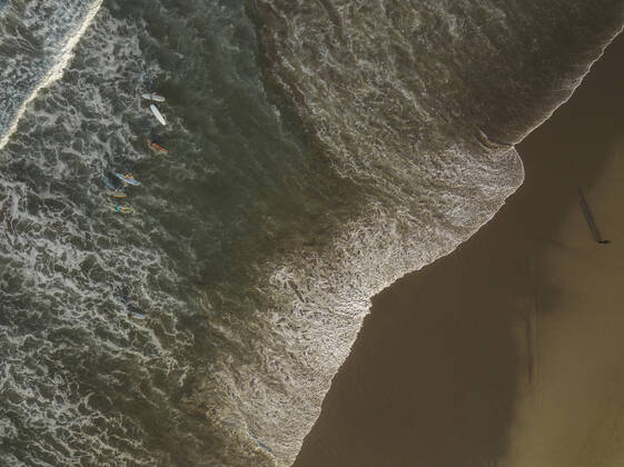 Aerial view of surfers at the beach Indonesia, Bali CR_KOTRIN191014C-220184-01