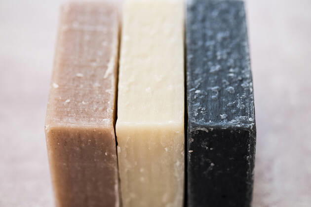 High angle close up of three bars of homemade bars of soap. High angle close up of three bars of homemade bars of soap.  59307