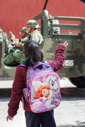 January 21, 2020, San Miguel De Allende, Guanajuato, Mexico: A young girl wearing a princess backpack waves to Mexican Soldiers during a parade to celebrate the 251st birthday of the Mexican Independence hero Ignacio Allende January 21, 2020 in San Miguel de Allende, Guanajuato, Mexico. Allende, from a wealthy family in San Miguel played a major role in the independency war against Spain in 1810 and later honored by his home city by adding his name. San Miguel De Allende Mexico - ZUMAe02_ 20200121_zaf_e02_019 Copyright: xRichardxEllisx