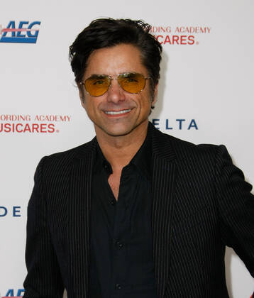 LOS ANGELES, CALIFORNIA - JANUARY 24: John Stamos attends MusiCares Person of the Year honoring Aerosmith at West Hall at Los Angeles Convention Center on January 24, 2020 in Los Angeles, California. Photo: CraSH imageSPACE MediaPunch Copyright: ximageSPACEx