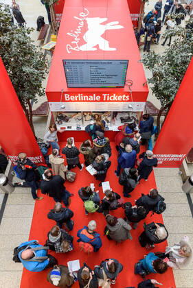 Start of ticket sales in the Potsdamer Platz Arkaden for the upcoming 70 Berlin International Film Festival Some cinema fans spent the night in front of the ticket counter snapshot photography F Boillot