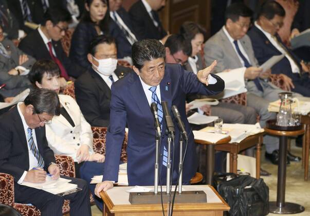 Japan PM Abe Japanese Prime Minister Shinzo Abe attends a House of Councillors Budget Committee session in Tokyo on March 3, 2020.