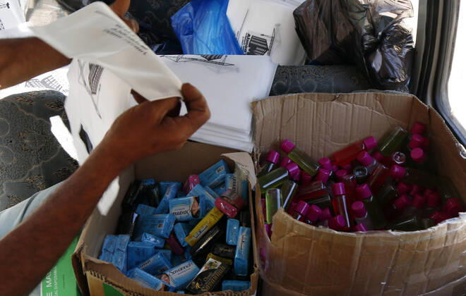 (200323) -- SANAA, March 23, 2020 -- A worker prepares health kits of masks and disinfectants to be distributed to orphan students in an orphan center in Sanaa, Yemen, March 23, 2020. A local charity organization in Sanaa distributed on Monday health kits of masks and disinfectants to Yemeni orphan students as an aid to protect them against the coronavirus. (Photo by Mohammed Mohammed Xinhua) YEMEN-SANAA-CORONAVIRUS-HEALTH KIT-DISTRIBUTION NiexYunpeng 