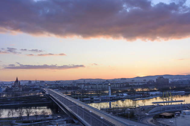 Vienna city center, river Donau (Danube), bridge Reichsbrücke, church Franz von Assisi, cathedral Stephansdom, Ferris Wheel in Prater, fierce sunset Wien, Vienna Wien Austria 22. Donaustadt
