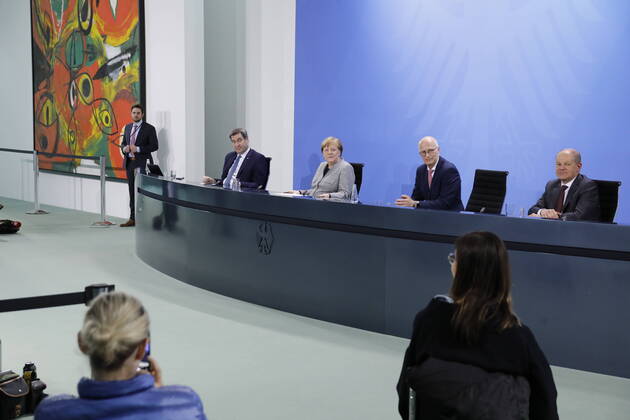 Markus Söder, Bavarian Prime Minister, Chancellor Angela Merkel, Peter Tschentscher, First Mayor of the Free and Hanseatic City of Hamburg, Olaf Scholz, Vice-Chancellor and Minister of Finance of the Federal Republic of Germany, Germany, Berlin, Federal Chancellery, Press conference by Chancellor Merkel following the discussion with the heads of government of the Länder in connection with the corona viru