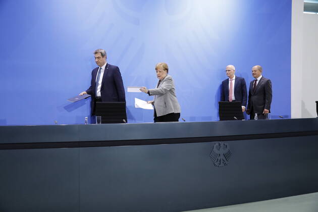 Markus Söder, Bavarian Prime Minister, Chancellor Angela Merkel, Peter Tschentscher, First Mayor of the Free and Hanseatic City of Hamburg, Olaf Scholz, Vice-Chancellor and Minister of Finance of the Federal Republic of Germany, Germany, Berlin, Federal Chancellery, Press conference by Chancellor Merkel following the discussion with the heads of government of the Länder in connection with the corona viru