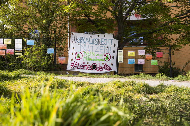 Protest poster with writing Pre-emption right Benefits, No to the billion-dollar empire on the bridle of a house bought by investors from Luxembourg, in Berlin on 17 April 2020 Coronavirus in Berlin