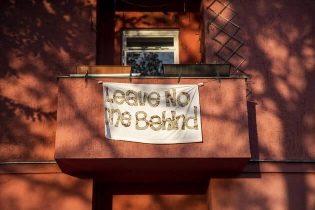 A banner with the writing Leave no one Behind in Berlin on 17 April 2020 Coronavirus in Berlin