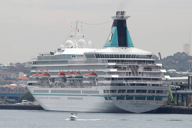 ARTANIA CRUISE SHIP DEPARTURE, The cruise ship Artania is seen preparing to depart Fremantle harbour on Saturday, April 18, 2020. The MV Artania arrived in Fremantle over three weeks ago and a reported 79 crew and passengers have tested poitive for coronavirus. Two crew members and one passenger have died from the virus. ( NO ARCHIVING, EDITORIAL USE ONLY, NO USE IN BOOKS WITHOUT CONSENT PERTH WA AUSTRALIA  Copyright: xRICHARDxWAINWRIGHTx 20200418001464074756